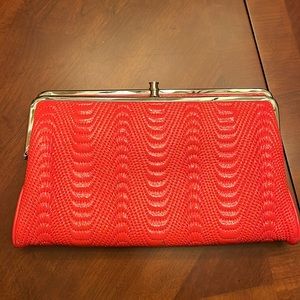 Hobo clutch new never used coral color!